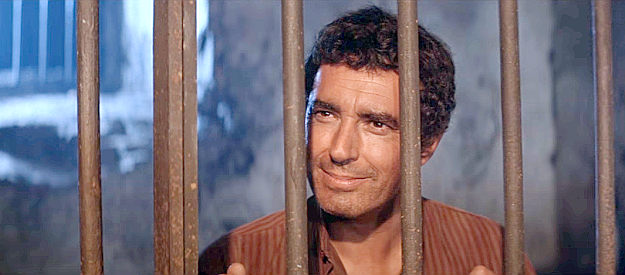 Virgilio Teixeira as Luis Delgado, offered a chance to escape a firing squad and join the seven in Return of the Seven (1966)