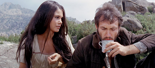 Wende Wagner as Tina, with the ailing gunman P.J. in Guns of the Magnificent Seven (1969)