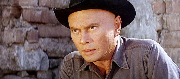 Yul Brynner as Chris, anticipating another attack from Lorca and his henchmen in Return of the Seven (1966)