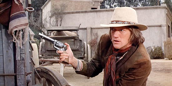 Luke Askew as Mark Skinner, helping invade Del Toro's stronghold in The Magnificent Seven Ride! (1972)