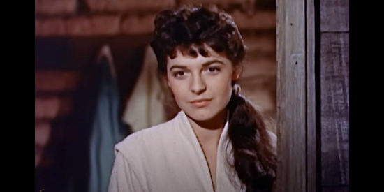 Anne Bancroft as Angelita, watching as Mitch Baker shares stories with the other orphAnne Bancroft as Angelita, watching as Mitch Baker shares stories with the other orphans in The Restless Breed (1957)ans in The Restless Breed (1957)