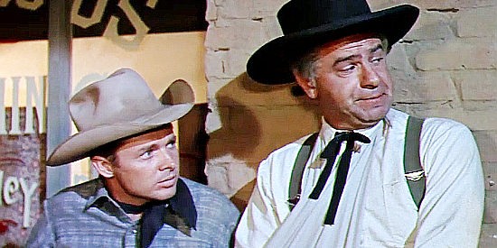 Audie Murphy as Joe Maybe as Walter Matthau as Judge Kyle Henry, about to walk into a showdown in Ride a Crooked Trail (1958)