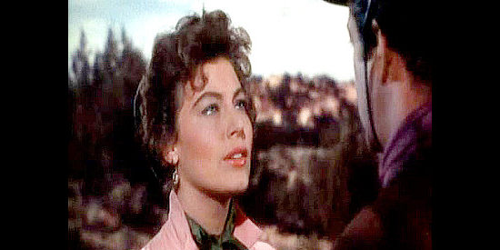 Ava Gardner as Cordelia Cameron, trying to convince Rio (Robert Taylor) to introduce her to the bandit Esqueda in Ride, Vaquero! (1953)