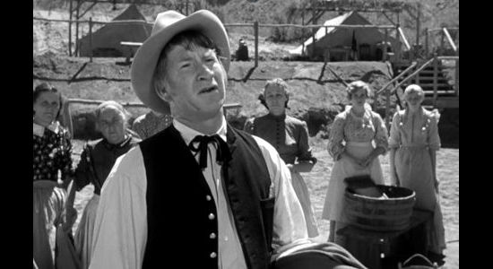 Chill Wills as Dr. WIlkins, the regimental surgeon, helping solve another problem in Rio Grande (1950)