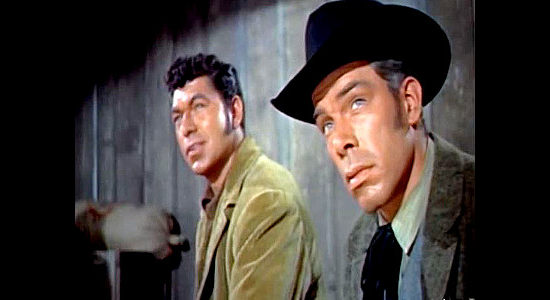 Claude Akins as Lt. Ramsey and Lee Marvin as Lt. Keating, listening to plans for the raid of a Vermont town in The Raid (1954)