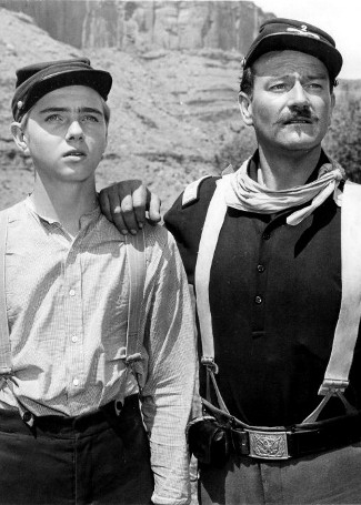 Claude Jarman Jr. as Jefferson Yorke and John Wayne as Lt. Col. Kirby Yorke in Rio Grande (1950)