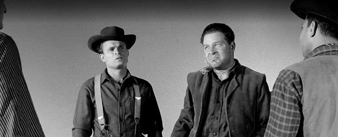Del Monroe as Curt and Louis Massad as Jones, cavalry deserters planning to join the gold hunt in Revenge of the Virgins (1959)