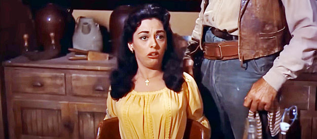 Estelita Rodriguez as Consuela Robante, fearful Burdette's men will harm Carlos in Rio Bravo (1959)