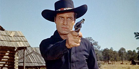 George Montgomery as 'Tex', about to settle a dispute with the help of his fast draw in Robbers' Roost (1955)