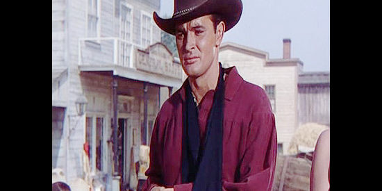 Gregg Palmer as Hal Jessup, wounded but still ready to help Sheriff Blaine try to stop Jim Averall in The Redhead from Wyoming (1954)