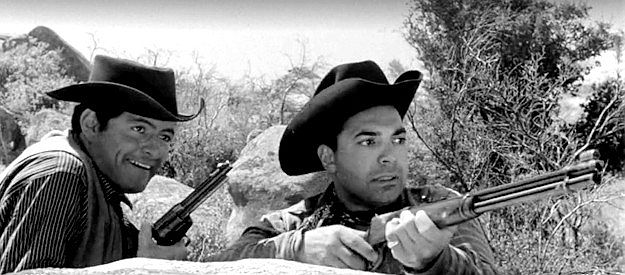 Hank Delgado (aka Henry Darrow) as Wade Connor and Hugo Stanger as Mike Horton prepared to ambush the cavalry deserters in Revenge of the Virgins (1959)