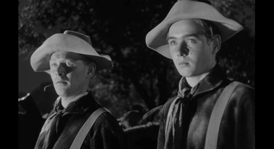 Harry Carey Jr. as Trooper Daniel 'Sandy' Bonne and Claude Jarman Jr. as Trooper Yorke in Rio Grande (1950)