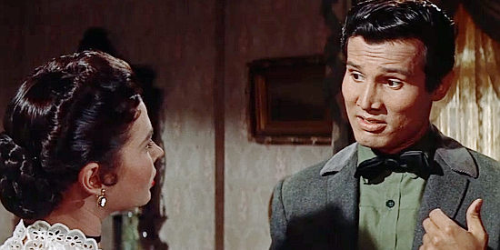 Henry SIlva as Sam Teeler, talking to lady love Tessa Milotte (Gia Scala) about a bank job in Ride a Crooked Trail (1958)