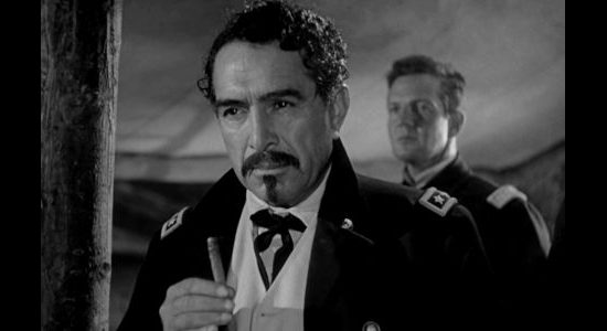 J. Carrol Naish as Lt. Gen. Philip Sheridan, giving Yorke the orders he's been awaiting in Rio Grande (1950)