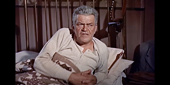 Jay Flippen as Marshal Evans, warning Mitch Baker not to take the law into his own hands in The Restless Breed (1957)