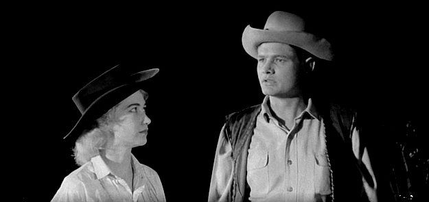 Jodean Russo (aka Jodean Lawrence) as Ruby Potter and husband Melvin (Charles Veltmann Jr.) realizing no one can be trusted in Revenge of the Virgins (1959)