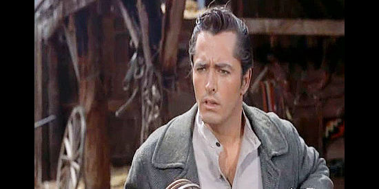 John Derek as Davey Bishop, a young man crippled in a case of mistaken identity in Run for Cover (1955)