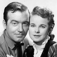 John Payne as Bill Mayhew and Mona Freeman as Elizabeth Sutton in Road to Denver (1955)