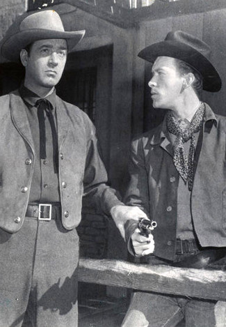 John Payne as Bill Mayhew and Skip Homeier as Sam Mayhew in Road to Denver (1955)