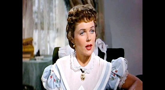 Joyce Mackenzie as Helen Shanessy, an old flame of Jefferson Harder, now married to his old friend in Rails Into Laramie (1954)