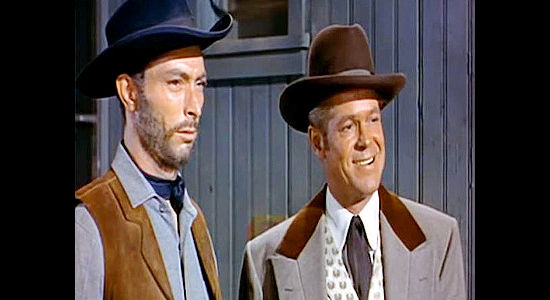 Lee Van Cleef as Ace Winton, a hired gun, with his boss, saloon owner Jim Shanessy (Dan Duryea) in Rails Into Laramie (1954)