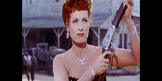 Maureen O'Hara as Kate Maxwell, trying to get the cattlemen and settlers to work together in The Redhead from Wyoming (1953)