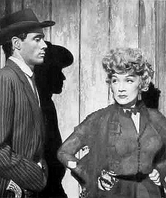 Mel Ferrer as Frenchie Fairmount and Marlene Dietrich as Altar Keane in Rancho Notorious (1952)