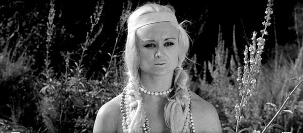 Nona Caver as queen of the Golden Horde of female Apache warriors in Revenge of the Virgins (1959)