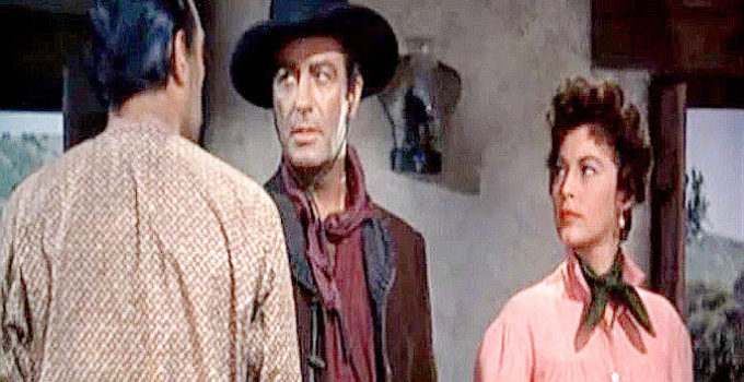 Robert Taylor as Rio and Ava Gardner as Cordelia Cameron in a confrontation with Jose Esquada (Anthony Quinn) in Ride, Vaquero! (1953)