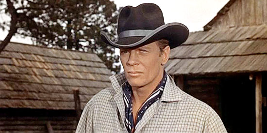 Peter Graves as Heesman, taking a job as foreman on the Herrick spread knowing he's going to try to steal the herd in Robbers' Roost (1955)