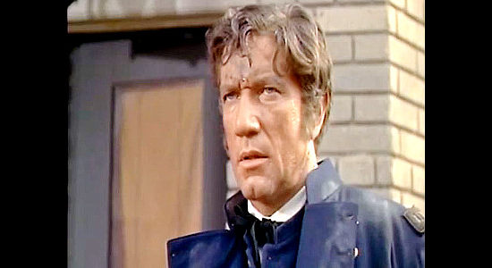 Richard Boone as Capt. Lionel Foster, the crippled Union veteran, defiant in the face of a Rebel attack on St. Albans in The Raid (1954)