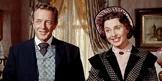 Richard H. Cutting as Curtis, the banker, and his wife (Mary Field) welcome Joe Maybe and his 'wife' to town in Ride a Crooked Trail (1958)