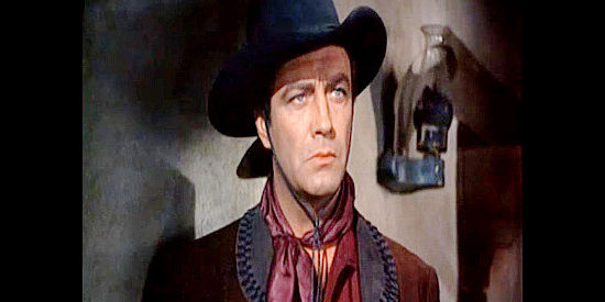 Robert Taylor as Rio, a man who doesn't much care who lives or dies until he meets Cordelia Cameron in Ride, Vaquero! (1953)