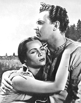 Sara Montiel as Yellow Moccasin with Rod Steiger as O'Meara in Run of the Arrow (1957)