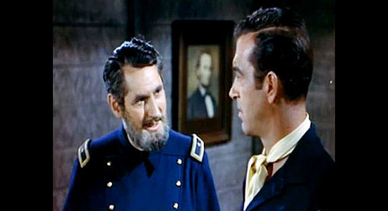 Stephen Chase as Gen. Augur, dispatching Jefferson Harder (John Payne) to Laramie to help a stalled railroad project in Rails Into Laramie (1954)