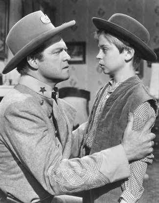 Van Heflin as Maj. Neal Benton with Tommy Rettig as Larry Bishop in The Raid (1954)