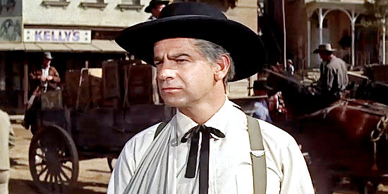 Walter Matthau as Judge Kyle Henry, beginning to suspect Joe Maybe isn't a famous lawman after all in Ride a Crooked Trail (1958)