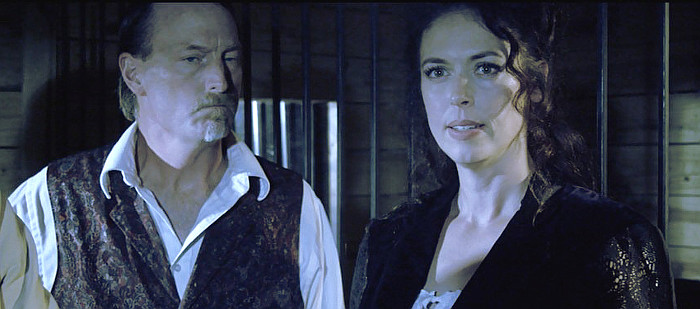David Moak as Henry Mannors and Amanda Miller as Camille Tammery in Western World (2017)