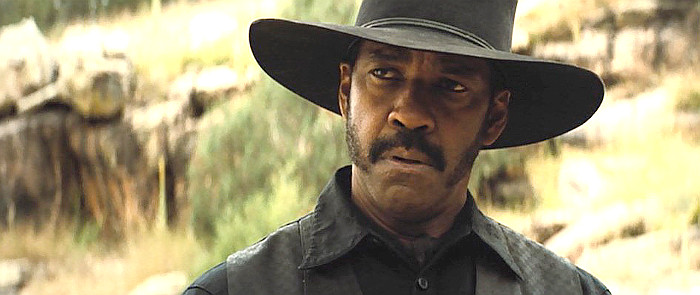 Denzel Washington as Sam Chisholm in The Magnificent Seven (2016)