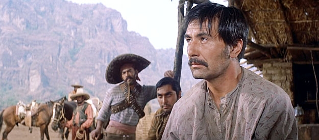 Rico Aleniz as Sotero, cowering under the threats of the bandit Calvero in The Magnificent Seven (1960)
