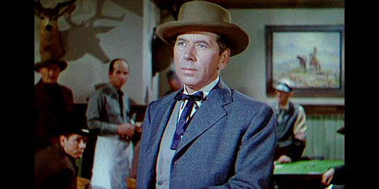 Alexander Knox as Will Isham, ready to declare war on Owen Merritt in Man in the Saddle (1951)