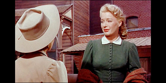 Ellen Drew as Nan Melotte, the woman who nurses Owen Merritt back to health after he's wounded in Man in the Saddle (1951)