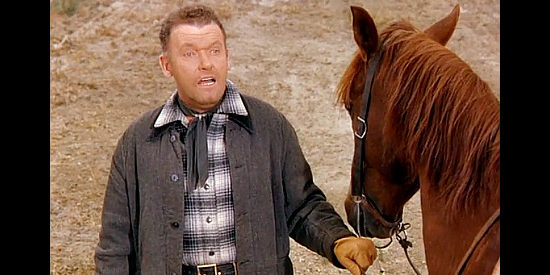 Frank Sully as Lee Repp, one of Will Isham's ranch hands in Man in the Saddle (1951)