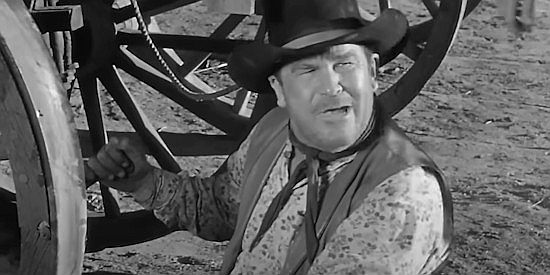 Guinn Williams as Peaceful, one of the men helping Sgt. Marlowe deliver repeating rifles in Massacre Canyon (1953)