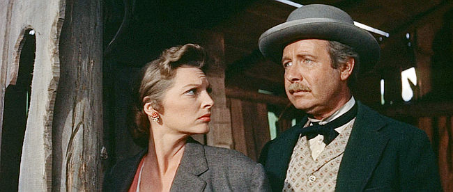 Julie London as Billie Ellis and Arthur O'Connell as Sam Beasley, at Dock Tobin's hideout in Man of the West (1958)