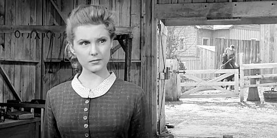 Karen Sharpe as Stella Atkins, engaged to a man fighting to hold onto his land in Man with the Gun (1955)