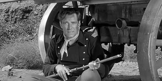 Philip Carey as Lt. Faraday, the oft drunk officer who takes command of the supply caravan in Massacre Canyon (1954)
