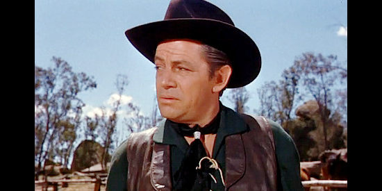 Richard Rober as Fay Dutcher, the fast gun Will Isham hires to kill Owen Merritt in Man in the Saddle (1951)