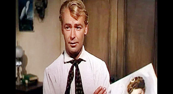 Alan Ladd as Jim Bowie insisting John James Audobon introduce him to the lovely lady in one of his paintings in The Iron Mistress (1952)