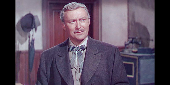 Albert Dekker as Alexander Kain, Jameson's attorney and the man who takes over his ranch in The Kid from Texas (1950)